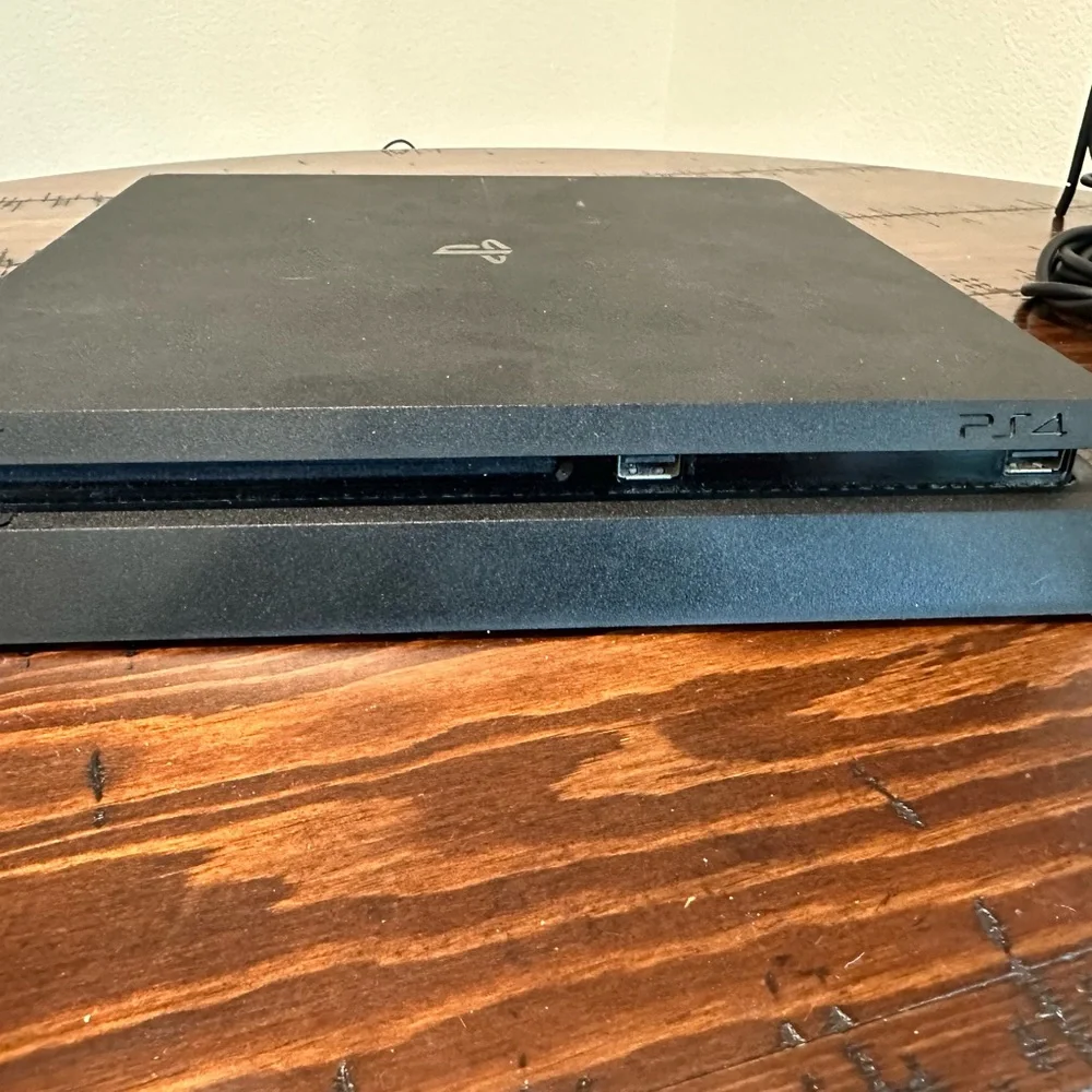 PlayStation 4 with games and controllers!